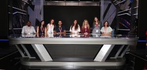 students sitting at cnn desk