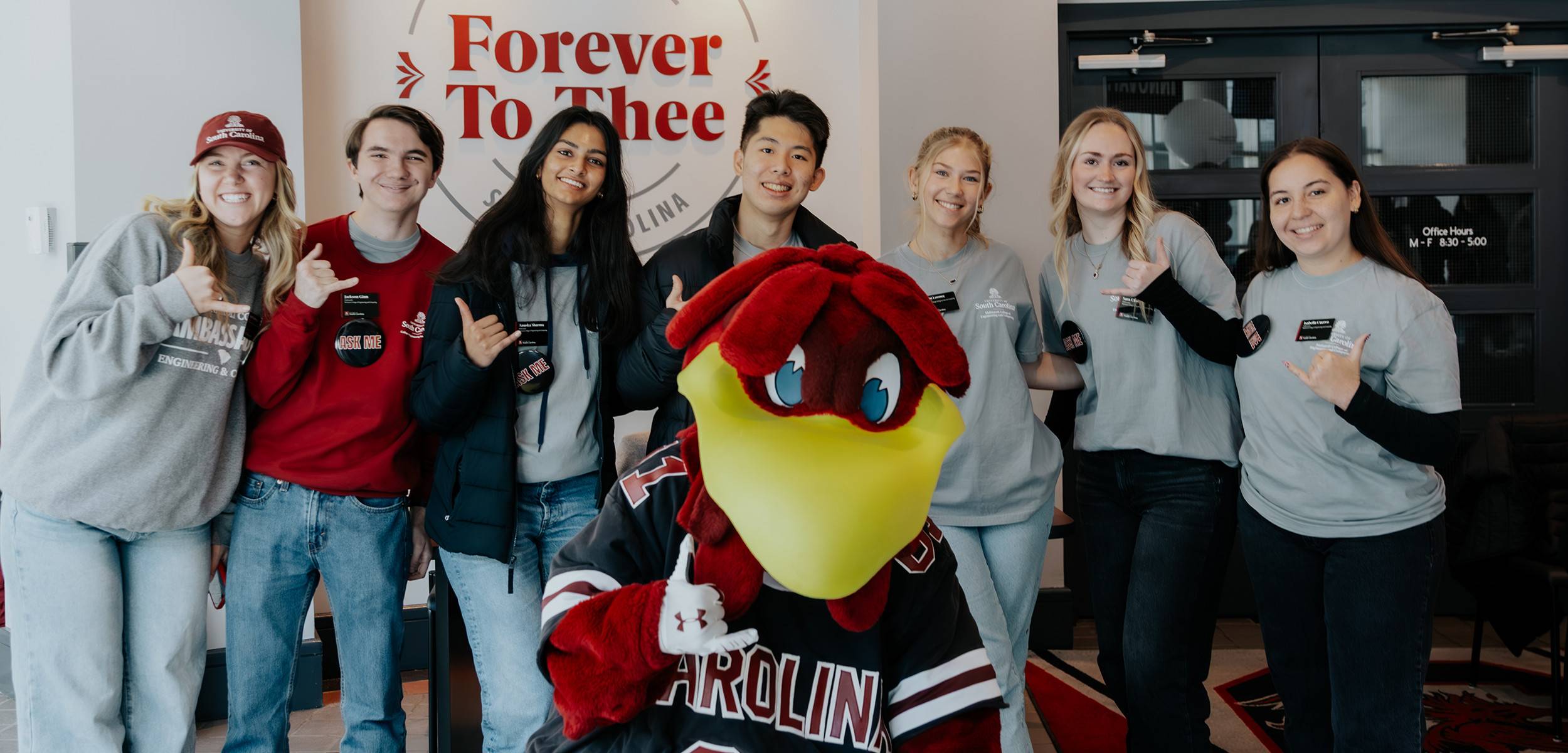 Line of Students looking at the camera with the university's mascot, Cocky