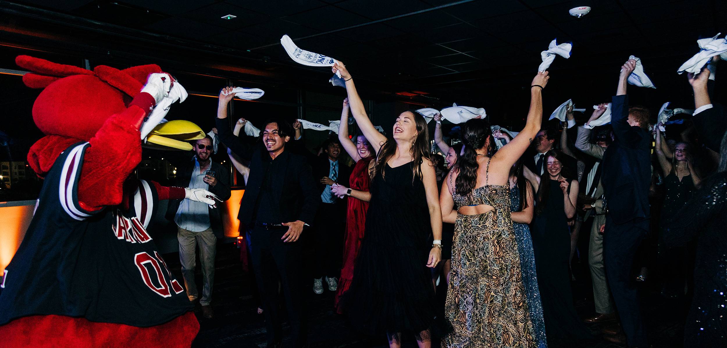 Students dancing with Cocky at Honors Gala
