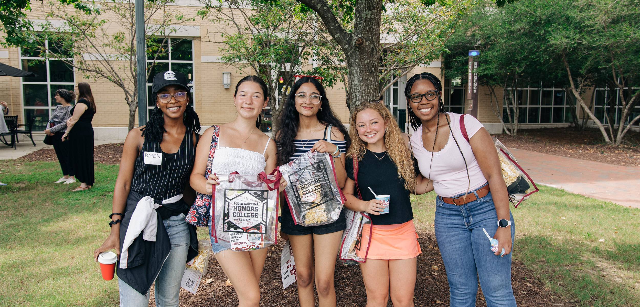 Group of students in front of the Honors Residence Hall
