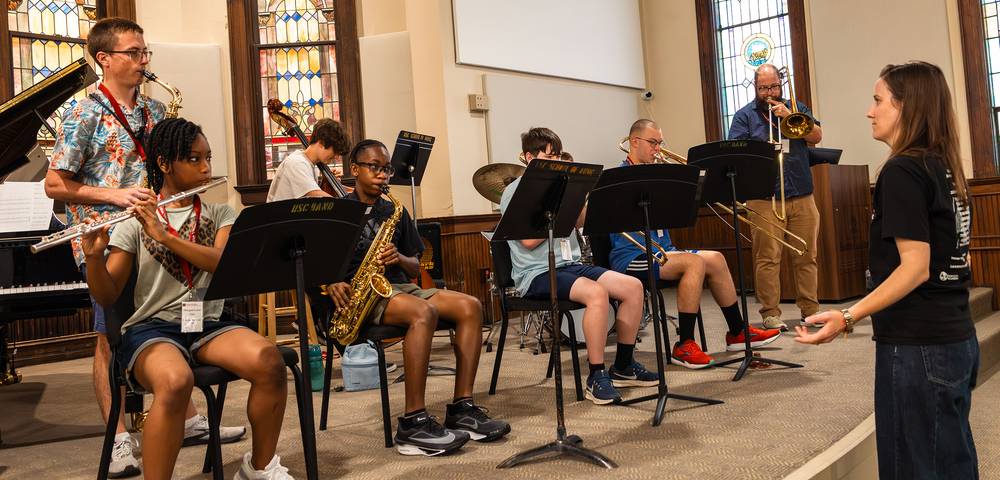 Gamecock Jazz Camp musicians rehearsing under the direction of Dr. Colleen Clark.