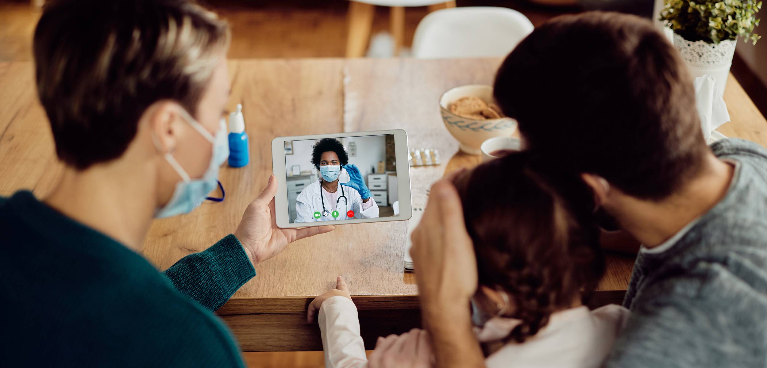 Family having telehealth conversation
